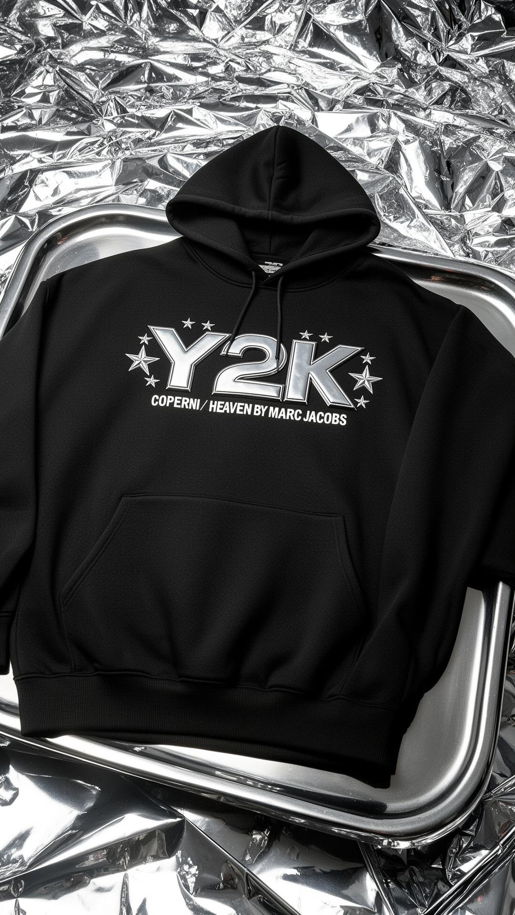 Chrome Y2K Hoodie — flat lay on foil